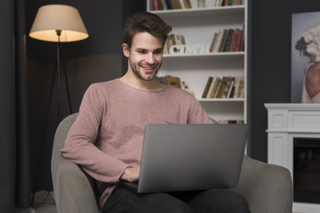 happy-man-looking-laptop_1.jpg